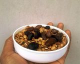 A picture of step 6 of Aki na Ukwa(Palm Kernel Nut and Toasted African Bread Fruit).