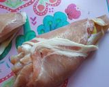 A picture of step 2 of Chicken wrapped in Bacon.