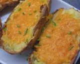 A picture of step 4 of Crispy Cheese & Ham Loaded Potato Boats.