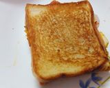 A picture of step 8 of Cheesy Egg sandwich.