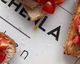 A picture of step 6 of Amalfi Bruschetta with Sardines, Piccolo Tomatoes & Basil.