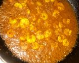 A picture of step 4 of Red prawn gravy in frying pan 🍳.