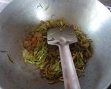 A picture of step 4 of Lau Khosa Posto Bhaja aka Roasted Bottle Gourd Peel.