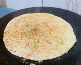 A picture of step 4 of Tomato Onion Dill Utthapam.