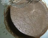 A picture of step 2 of Oreo tart with chocolate custard pudding.