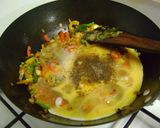 A picture of step 3 of Scrambled Eggs with Bell Peppers.
