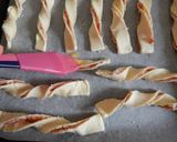 Foto del passaggio 4 della ricetta Grissini al prosciutto