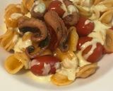 Foto del passaggio 2 della ricetta Orecchiette con datterini interi moscardini saltati e crema di feta