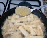A picture of step 5 of Cassava Crisps infused with Garlic.