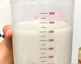 A picture of step 5 of Frozen Piña Colada.