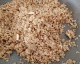 A picture of step 3 of Leftover roti Churma lodoo.
