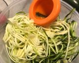 A picture of step 3 of Zucchini Spaghetti with Tomato Sauce, Kalamata Olives, Feta, and Radishes.