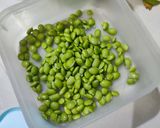 A picture of step 1 of Green Soyabean Curry.