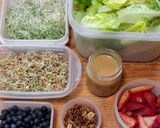 A picture of step 1 of Green Salad with Strawberries, Blueberries, and Savory Granola.