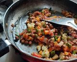 A picture of step 3 of Oats vegetables innovative upma.