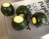 Une image de l'étape 1 de Courgettes rondes façon potatoes aux herbes de Provence et épices méridionales.