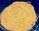 A picture of step 7 of Spaghetti with Shrimp and Scallops in Garlic Butter Sauce.