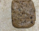 A picture of step 6 of Square milk choco cookies in a cookie dough batter.