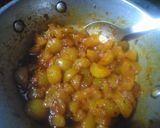 A picture of step 6 of Khatte meethe Amla.