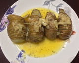 Foto del paso 4 de la receta: Patatas hasselback asadas con ajos confitados y mantequilla