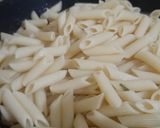 A picture of step 4 of Onion Tomato Pasta.