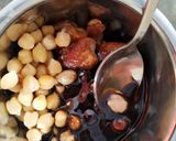 A picture of step 1 of Znoud-el-sit with creamy choco hummus filling and red grape sauce.