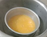 A picture of step 1 of Egg and Spinach curry.