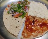 A picture of step 2 of Roti Pizza Wrap.