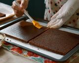 A picture of step 8 of Tiramisu, and Cocoa Sponge with plenty of Coffee Syrup.
