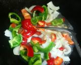 A picture of step 4 of Stir fry shrimp and paprica.