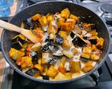 A picture of step 14 of Eggplant Curry with Mushrooms, Tomatoes, and Coconut Milk.