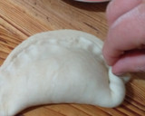 Foto del paso 3 de la receta: Empanadas queso, aceitunas y orégano