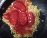 A picture of step 2 of Pork and beef meatballs in a slow braised tomato sauce and pasta.