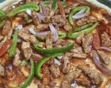 A picture of step 5 of Chicken fajita pizza.