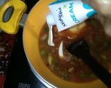 A picture of step 4 of Macroni In Tomato Sauce.