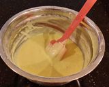 A picture of step 8 of Patriotic Vanilla Cake Roll with Whipped White Chocolate Ganache Filling and Frosting.