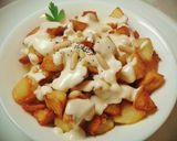 Foto del paso 9 de la receta Patatas fritas con crema de queso gouda