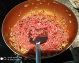 Foto del paso 4 de la receta: Pimientos rellenos de carne y arroz con queso rallado