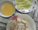 A picture of step 3 of (Snack) Fried Sandwich-Wrapped Sausages.