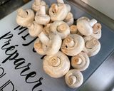 Une image de l'étape 13 de Rouelle de porc confite aux pommes de terre, carottes et champignons.