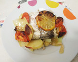 Foto del paso 3 de la receta: Lubina al horno con patatas, tomates y ajos laminados