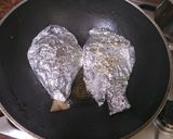 A picture of step 4 of Green masala stuffed fish pomfret.