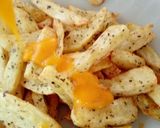 Foto del paso 2 de la receta: Papas fritas con salsa cheddar saborizada con panceta