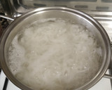 Foto del paso 4 de la receta: Fideos de arroz con bambú, pollo y soja