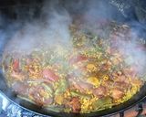 A picture of step 13 of Paella with Vegetables and Meat.