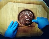 صورة لخطوة 7 من وصفة طاجن كيكة🍞بالنسكافيه والشيكولاتة السايحة🍫😋