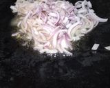 A picture of step 2 of Tawa masaledar kale chanay.