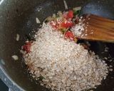 A picture of step 2 of Oats Upma.