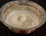 A picture of step 12 of Apple Spice Layer Torte with Caramel Mousse Filling and Frosting.