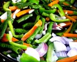 A picture of step 1 of Stir fried chicken with vegetables.
